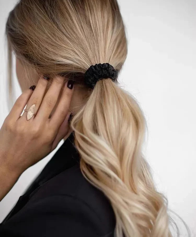 Satin Scrunchies by Soie — worn in a low ponytail